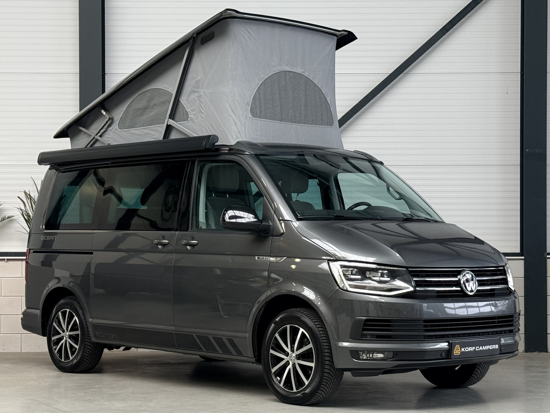 Volkswagen  California T6 Ocean 150PK DSG Edition | LED | Elektr.Hefdak | Navi 52563661-0.jpg | Korf Auto